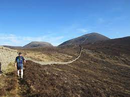 The mourne mountains, usually just referred to as the mournes, are the highest peaks of northern ireland. Running The Mourne Wall Hikersblog