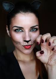 Kiddos will get a kick out of this colorful kitten face paint idea. 15 Black Cat Face Paint Ideas Cat Halloween Makeup Halloween Makeup Cat Makeup