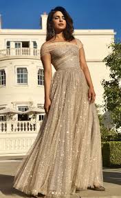 Of the second dress, kensington palace shared in a statement, the bride's evening dress is designed by stella mccartney and is a bespoke lily white high neck gown made of silk crepe.the bride is. Meghan Markle Friend Priyanka Chopra Reveals What Happened At Royal Wedding Reception Celebrity News Showbiz Tv Express Co Uk