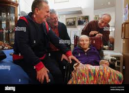 Doris Sperber, 109 is joined by three of her four sons, ( l to r ) Fred,  74, David, 74 and Steve, 80, at the Jewish Home of San Francisco,