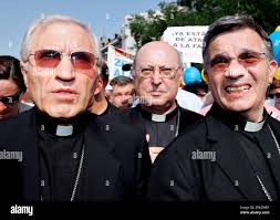 FILE** The archbishop of Madrid Jose Antonio Maria Rouco Varela, left,  marches with others during a demonstration in Madrid, in this June 18, 2005  file photo to protest the Socialist government's bill