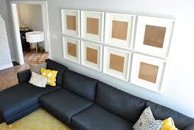 How high does you should hang a picture? How To Hang A Grid Of Frames Over The Couch And What Not To Do Young House Love