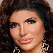 Cynthia Bailey's Blunt Blonde Bob and Blue Minidress