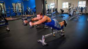Dumbbell front raise is an essential exercise for bodybuilders. Lying Dumbbell Front Raise On Incline Bench Video Exercise Guide Tips