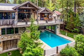 The designer's task was to use the maximum amount of wood so as to create a feeling of nature inside the cabin and enjoy the starry sky on a small porch on california summer evenings. Hidden Lake Tahoe Geothermal House Selling For 12 Million