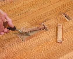 How do you fix a hole in a hardwood floor? How To Repair Hardwood Flooring Hometips