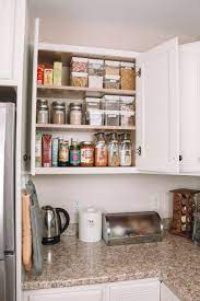 How To Organize Your Pantry In An Apartment Hey Its Camille Grey Apartment Smallspa Apartment Kitchen Organization Small Apartment Kitchen Apartment Pantry
