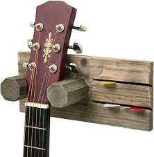 He is your kitchen storage organizer!it takes up no extra self baskets can hanging everywhere on the racks.so easy to take.which is awesome. Amazon Com Mygift Wall Mounted Graywashed Brown Wood Guitar Hanging Rack With Pick Holder Kitchen Dining Guitar Wall Hanger Guitar Wall Hanging Guitars