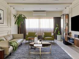 A living room designed in brown color became an example of a classic interior solution. Best Living Room Interior Design In India