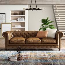 Living room decorated in classic new england style, keeping a traditional and neutral décor with its classic chesterfield. Sand Stable Haskell 98 Genuine Leather Rolled Arm Chesterfield Sofa Reviews Wayfair