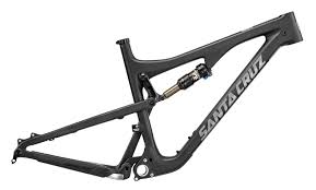 This unmarked bike's carbon frame looks like the love child of the current nomad and a v10, with a split seat tube, and a rocker link that's noticeably longer. First Ride 2016 Santa Cruz Bronson Bike Magazine