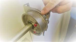 Once the door is safely secured, you can remove the cable from the bottom of the garage door (looped around a peg) as well as the drum (unravel the cable). How To Align Garage Door Cable Torsion Cable Diy Garage Door Repair Youtube