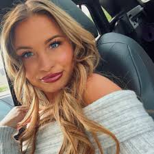 What salons in Traverse City area offer hair touch-ups and trims near the  mall or Chums Corner?