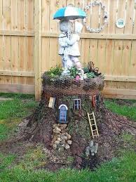 20 Creativity Ideas With Tree Stump For Your Outdoor Tree Stump Planter Fairy Tree Houses Fairy Garden