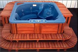 The steps feature sturdy resin construction in an attractive redwood color. Spa Surrounds Redwood Spa Surrounds Hot Tub Surrounds Custom Made Par Pool Spa Hot Tub Surround Hot Tub Hot Tub Outdoor