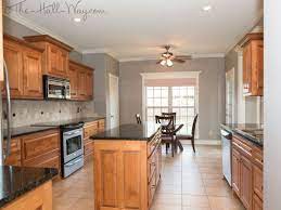 Oak kitchen cabinets are very popular and we can even find them in every house. Oak Cabinets Ideas On Foter Kitchen Wall Colors Oak Kitchen Cabinets Trendy Kitchen Colors