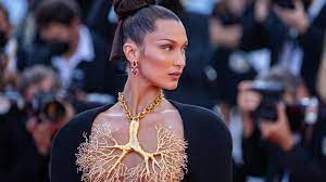 Find out the latest pictures, still from movies, of bella hadid is turning up the heat with her captivating pictures on. Bella Hadid S Schiaparelli Gown At Cannes Showed Her Tiny Underboob Tattoo See Photos Teen Vogue