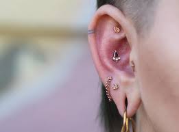 We sell jewelry you'll love & feel great wearing. Fresh Conch Piercing By Alana At Rose Gold S Tattoo And Piercing Rhodolite Garnet And Diamonds Set In Rose Gold Legitpiercing