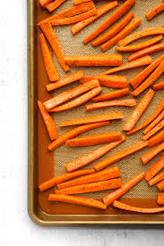 To keep the fries light, we breaded them simply in flour, egg and milk, and panko (plus some parm because yum), and baked in the oven for 25 minutes until they get nicely. Roasted Carrot Fries Recipe Posh Plate