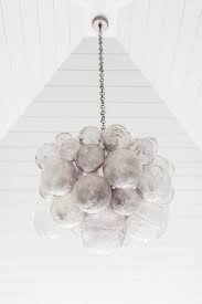 Southern Home With Neutral Interiors Hand Blown Glass Chandelier Oly Studio Muriel Chandelier Bubble Chandelier House Lighting Fixtures Hand Blown Glass