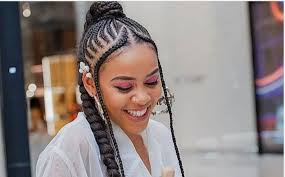 To make your girl's braided style more interesting, try to experiment with volume. Sho Madjozi Ubetoo