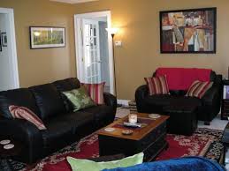 Black And Gold Leather Couch Decorating A Living Room With A Red Leather Couch Gold Walls And Wood Room With Black Leather Sofas And Red And Green Living Room Red Leather Couches Room