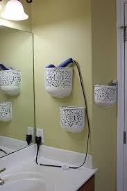 Build or buy a deep picture frame and hang it around your toilet paper holder. Hacks To Make The Most Of Your Tiny Bathroom New Decorating Ideas