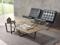Stelios mousarris has realized the 'wave city' coffee table that bends a landscape of buildings in half, using the overlapping surface as the tabletop. City Coffee Table Pacini Cappellini