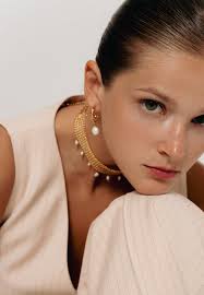 Blaue und goldene Ohrringe