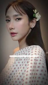 Aum Athichart and Janie