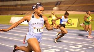 Sprinter and starting blocks on a track. Kevona Davis And Deandre Watkin Win U20 100m Titles At Carifta Trials Loop Jamaica