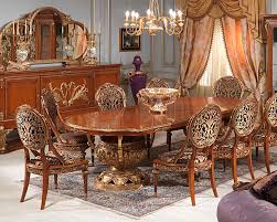 The table reflects highly decorative base with oversized scrolled feet, upholstered and tapestried chairs with the nail head trim accents, presenting a classic character. Louis Xvi Style Table Versailles Vimercati Meda Luxury Classic Furniture Wooden Wooden Base Oval