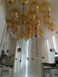 Balloon Ceiling With A Touch Of Embarrassing Photos Black And Gold Party Decorations Black And Gold Balloons Helium Balloons Decoration