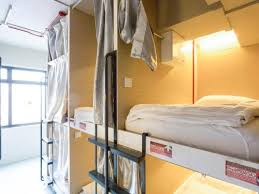 A dormitory (originated from the latin word dormitorium, often abbreviated to dorm) is a building primarily providing sleeping and residential quarters for large numbers of people such as boarding school, high school, college or university students. Central 65 Hostel Cafe Sg Clean Certified In Singapore Room Deals Photos Reviews