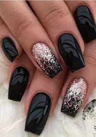 We are all guilty of having too much black in our wardrobes. Black Nail Art Black Nails With Glitter Nail Art Manicure Ombre Nail Designs