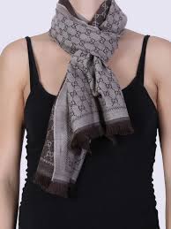 Mix it thoroughly in the water to prepare the scarf for a soak. Gucci Gg Jacquard Wool Shawl Brown Luxury Bags