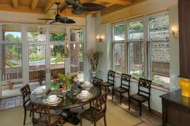 Glamorous square dining table for 8 by rockefeller partners architects. Tropical Dining Room With Round Table Hgtv