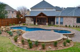 Check spelling or type a new query. Murphy Boulder Waterfall Pool Spa Covered Outdoor Kitchen Bar Contemporary Pool Dallas By Ortus Exteriors Houzz