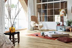 Energetic colors, vintage decor, and layers of fringed throws add whimsy and comfort to this creative space. Boho Chic Inspiration