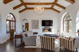 In the living room, she added a paola navone sofa and a slipper chair by paul marra design to play off the extravagant fireplace. 15x20 Family Room Ideas Photos Houzz