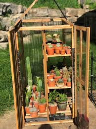 Build a diy greenhouse using upcycled windows I See Your Mini Diy Greenhouse And Raise You A Slightly Larger But Still Small Diy Green House Succulents