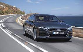 Download Wallpaper Audi A7 Sportback 55 Tfsi 4k Street 2018 Cars Motion Blur A Woman Driving The New A7 Sportback Audi A7 Audi A7 Sportback Audi A7 Price