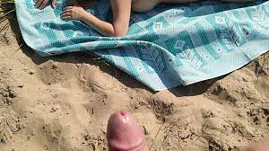 Jerked dick and came on a woman sunbathing on a wild beach | xHamster