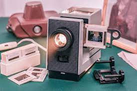 This is an explanation of an older piece of technology. Slide Projector Film Strip Of Technology Lens Equipment Retro Technique Old Pikist