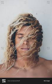 It great on almost all guys who want a casual look and is pretty easy to maintain too. Portrait Of Young Hispanic Surfer With Bleached Blonde Hair Stock Photo Offset