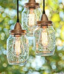 I centered it over my patio dining table. Photos 7 Outdoor Lights That You Can Make Jar Lights Mason Jar Lighting Diy Outdoor Lighting