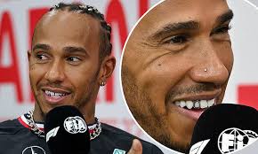 Lewis Hamilton wears a gold tooth grill as fashion loving Formula One ace  fields questions ahead of the Japan Grand Prix