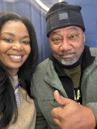 Realtor congratulates clients