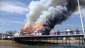 Crews attended the scene and found that the fire had been put out prior to their arrival. Fire Rips Through Eastbourne Pier Destroying Roof Bbc News