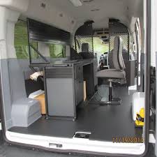 A Completed Upfit Package With An Ergonomic Solutions Mobile Office Vango Desk Chair And Sliding Chair Base In The Ba Mobile Office Van Interior Ford Transit